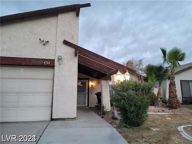 view of front of home with a garage