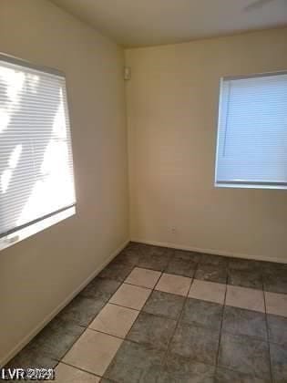 view of tiled spare room