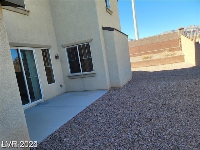 view of yard with a fenced backyard and a patio area