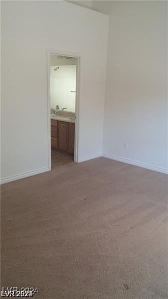 unfurnished room with carpet