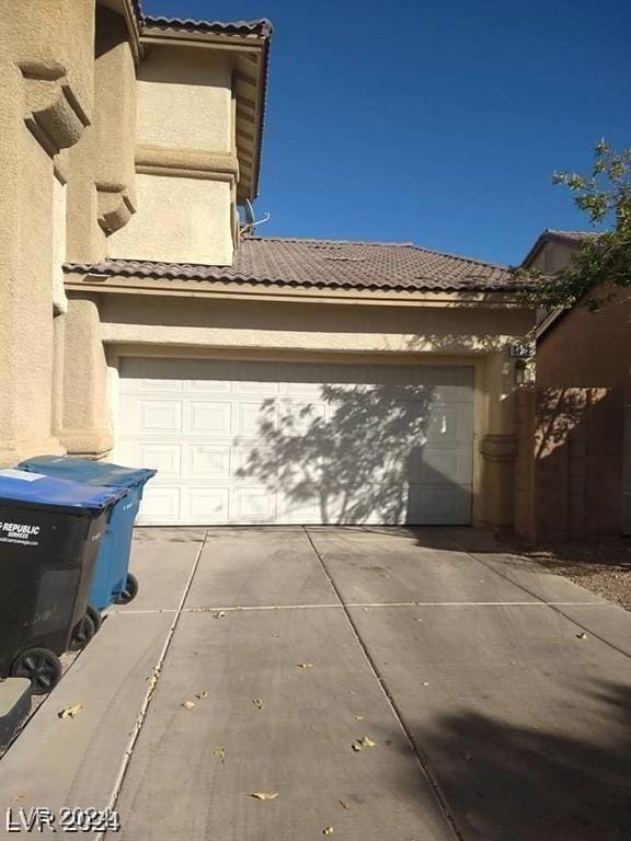 garage with driveway