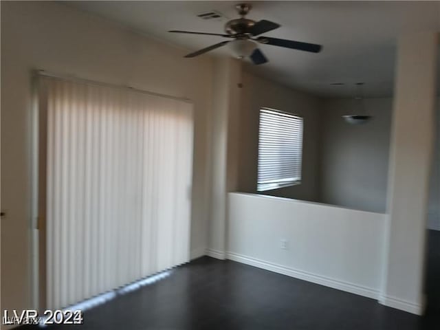 spare room featuring visible vents and ceiling fan