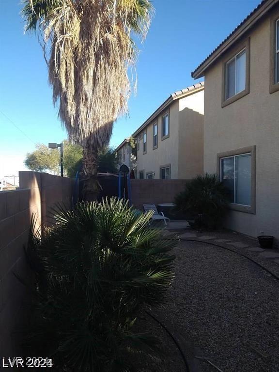 view of yard with a patio area and fence