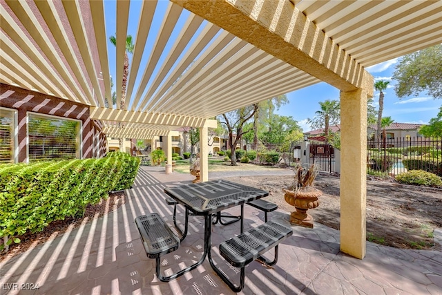 view of patio featuring a pergola