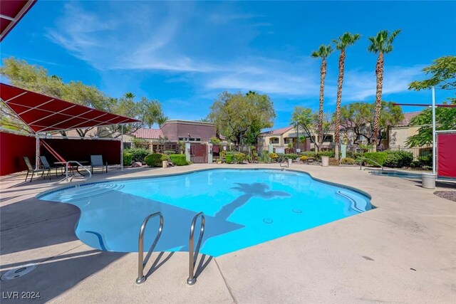 view of pool featuring a patio area