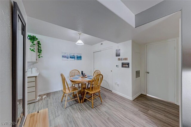 dining space featuring light hardwood / wood-style floors