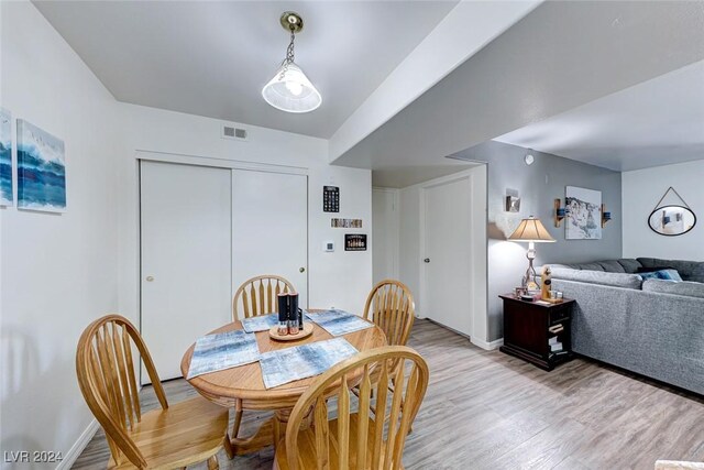 dining room with light hardwood / wood-style floors