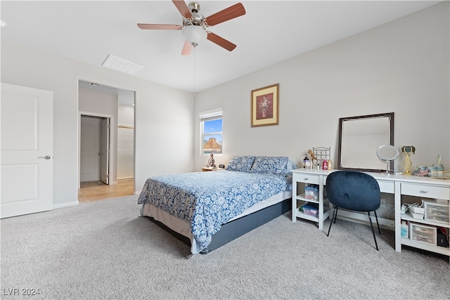 bedroom featuring ceiling fan and light colored carpet