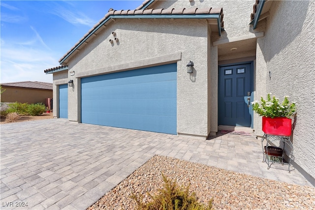 exterior space with a garage