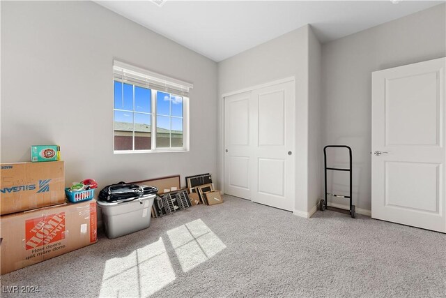 game room featuring light colored carpet