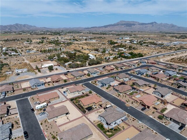 drone / aerial view featuring a mountain view