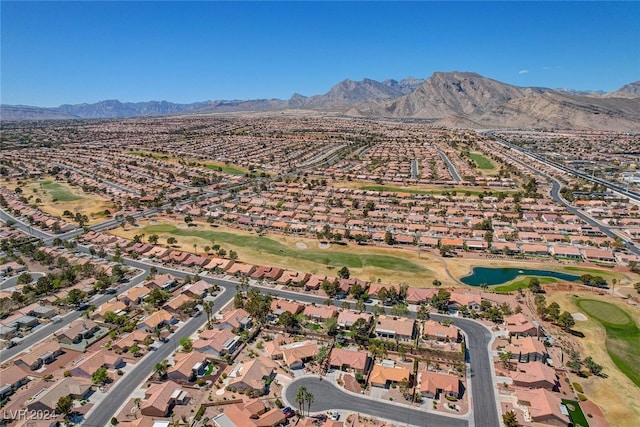 aerial view with a residential view and a water and mountain view