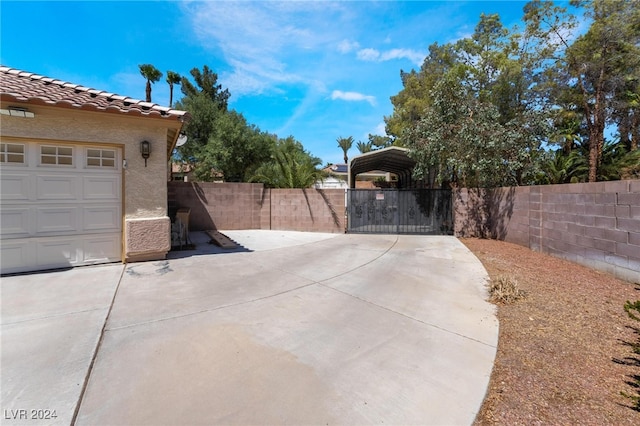 view of patio featuring a garage