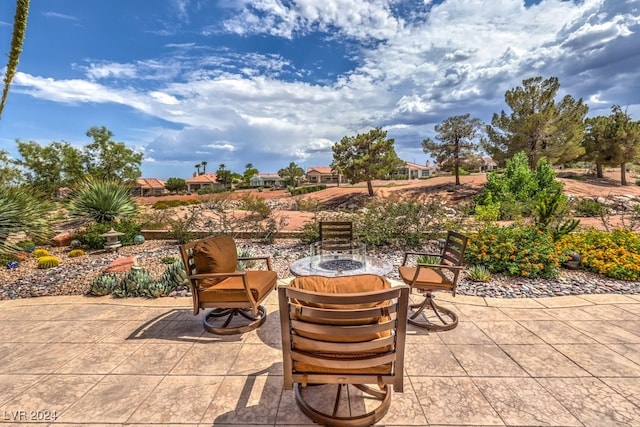 view of patio / terrace featuring a fire pit