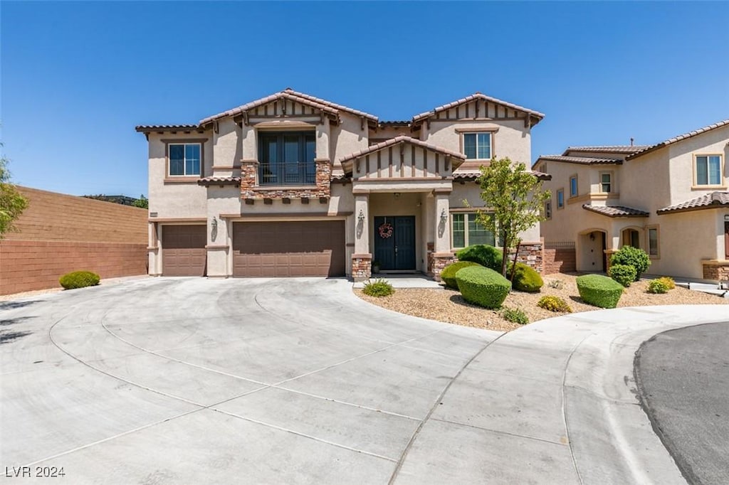 view of front of home with a garage