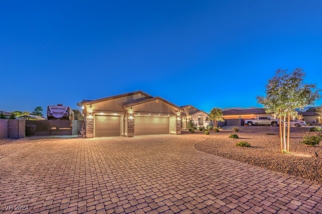 ranch-style home featuring a garage