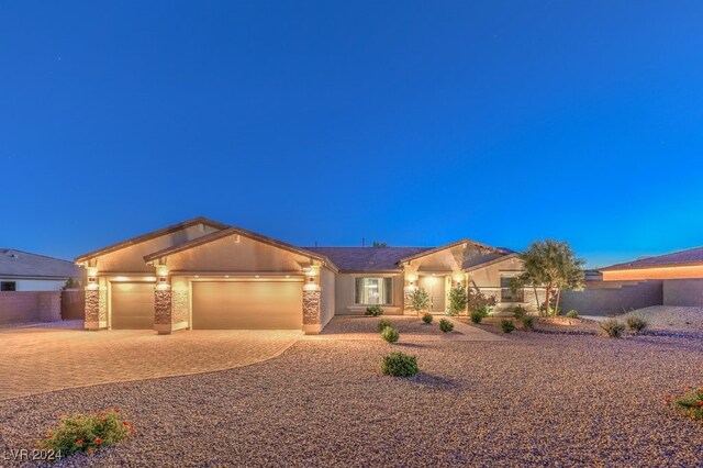 single story home with a garage