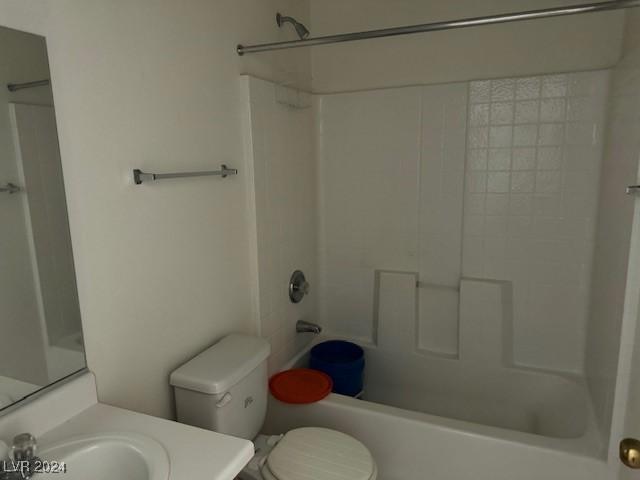 full bathroom featuring vanity,  shower combination, and toilet