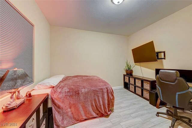 bedroom featuring light hardwood / wood-style flooring