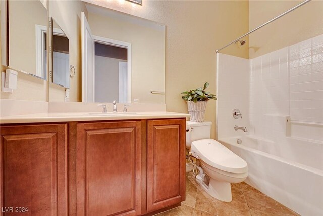 full bathroom with washtub / shower combination, toilet, tile patterned floors, and vanity