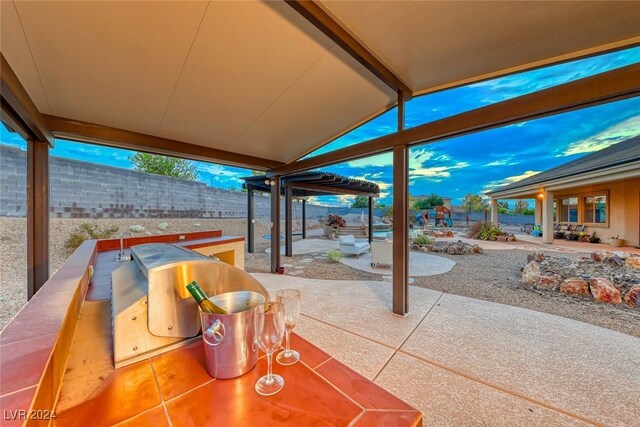 view of patio / terrace featuring an outdoor kitchen