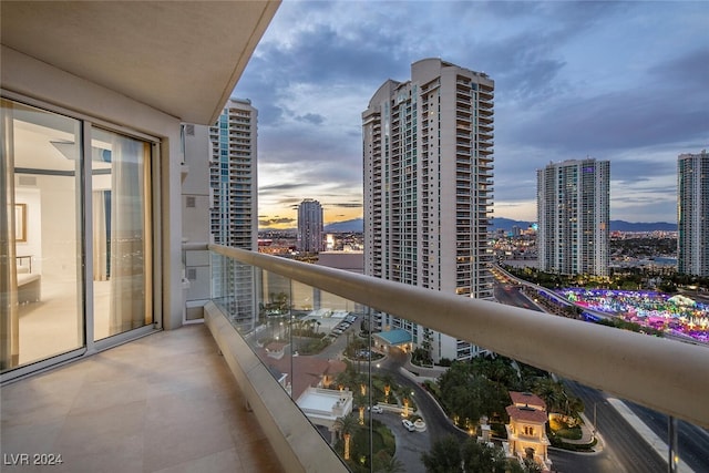 view of balcony at dusk