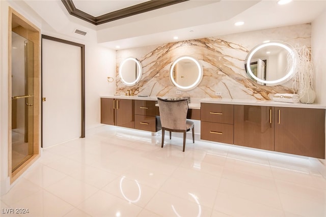 bathroom with tile patterned floors and vanity