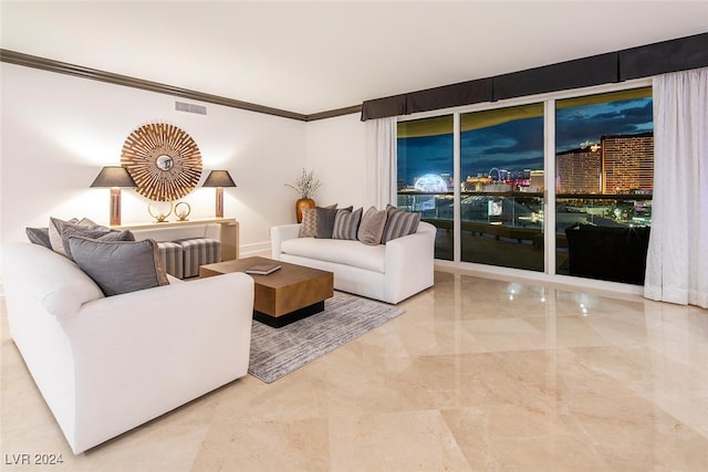 tiled living room with crown molding