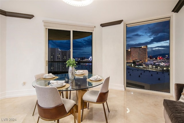 dining area featuring light tile patterned floors