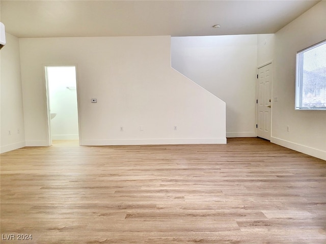 unfurnished room featuring light hardwood / wood-style flooring