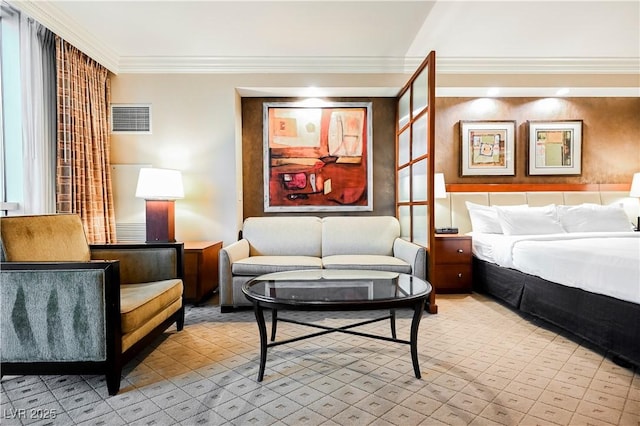 bedroom with ornamental molding and visible vents