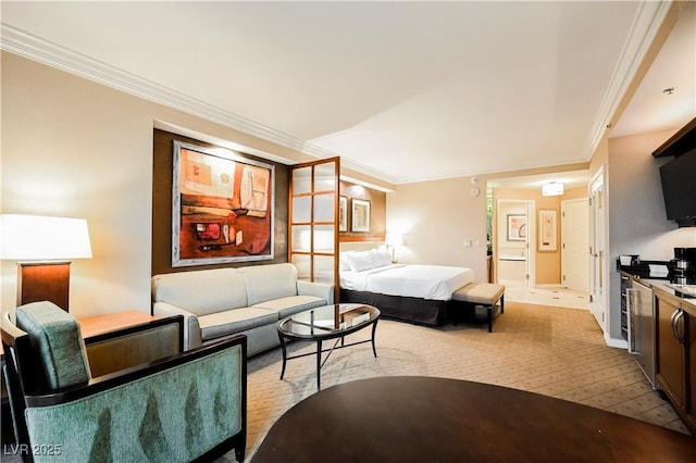 bedroom with light wood-style floors and ornamental molding