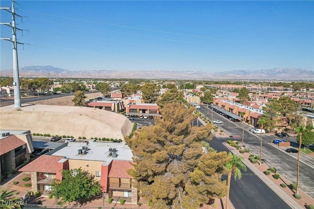5185 Indian River Dr Unit 225, Las Vegas, NV 89103 - aerial perspective of suburban area featuring a mountainous background