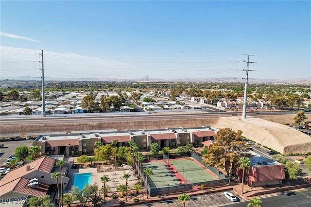5185 Indian River Dr Unit 225, Las Vegas, NV 89103 - aerial perspective of suburban area featuring a pool