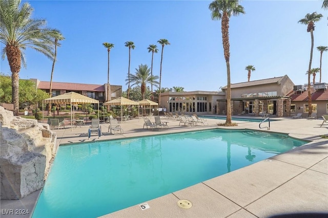 5185 Indian River Dr Unit 225, Las Vegas, NV 89103 - community pool with a patio area and a gazebo