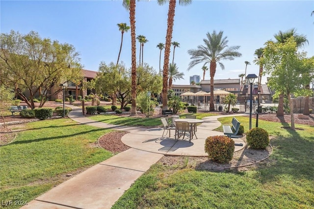 5185 Indian River Dr Unit 225, Las Vegas, NV 89103 - surrounding community featuring a lawn