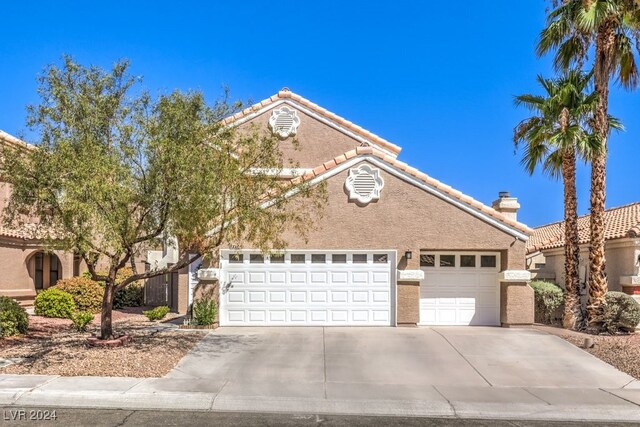 front facade with a garage