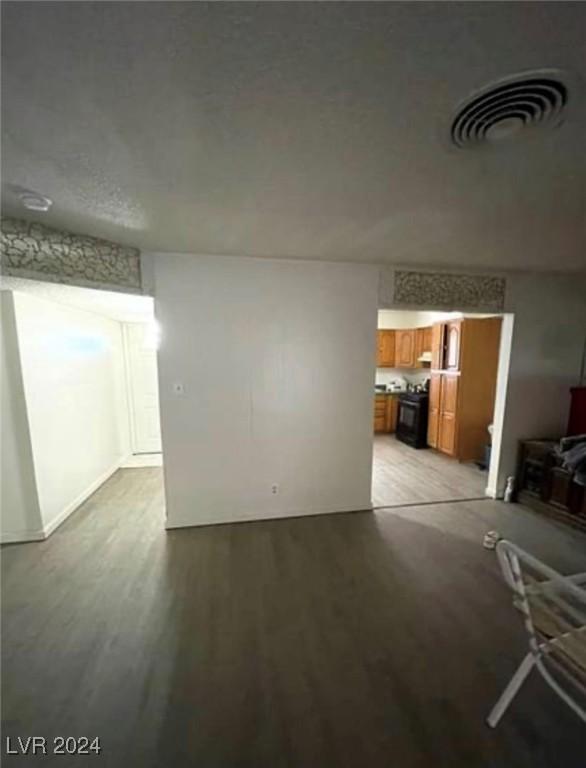 unfurnished living room featuring light hardwood / wood-style flooring