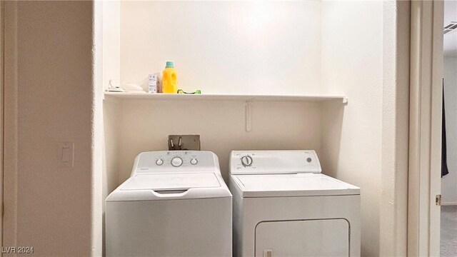 laundry area featuring washing machine and dryer