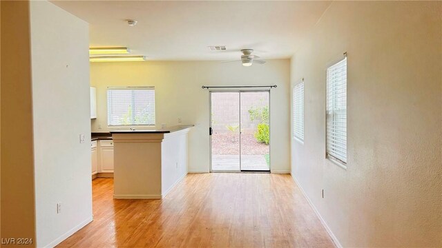 entryway featuring light hardwood / wood-style floors and ceiling fan