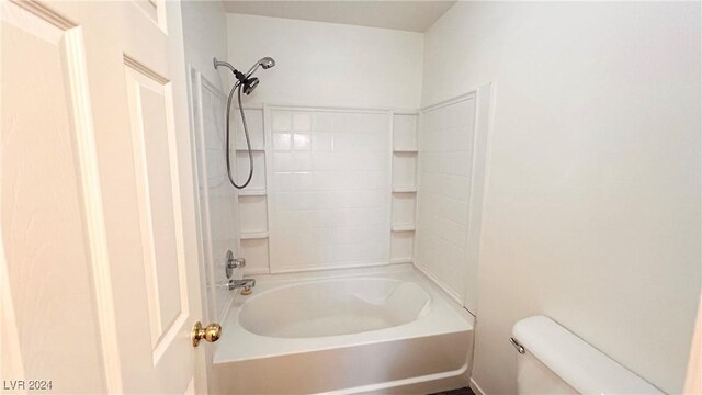 bathroom with toilet and shower / bathtub combination