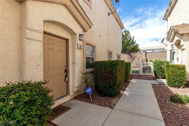9333 Leaping Deer Pl Unit 102, Las Vegas, NV 89178 - entrance to property with stucco siding