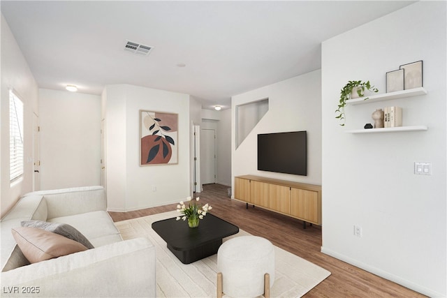9333 Leaping Deer Pl Unit 102, Las Vegas, NV 89178 - living area with wood finished floors and baseboards