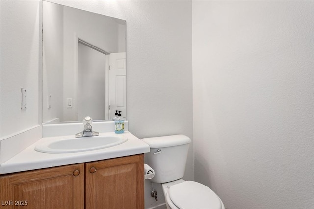 9333 Leaping Deer Pl Unit 102, Las Vegas, NV 89178 - half bath featuring vanity and toilet