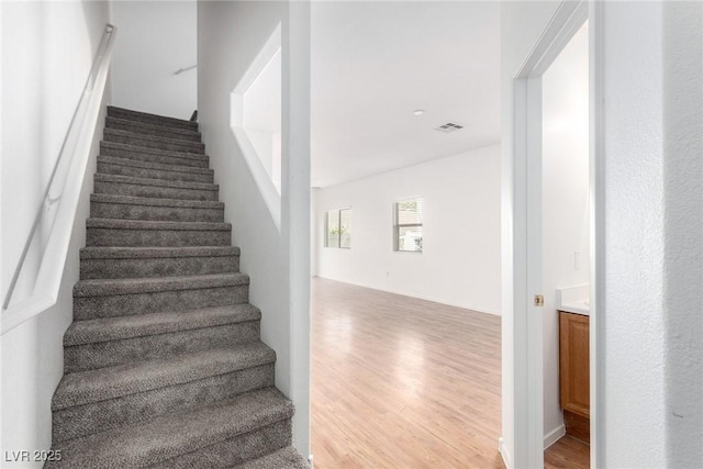 9333 Leaping Deer Pl Unit 102, Las Vegas, NV 89178 - stairway with wood finished floors