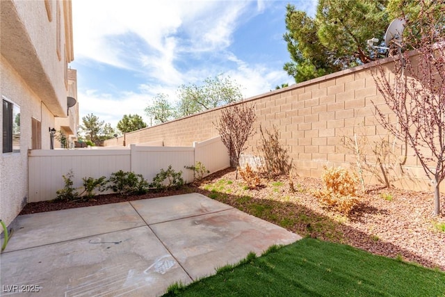 9333 Leaping Deer Pl Unit 102, Las Vegas, NV 89178 - fenced backyard featuring a patio area