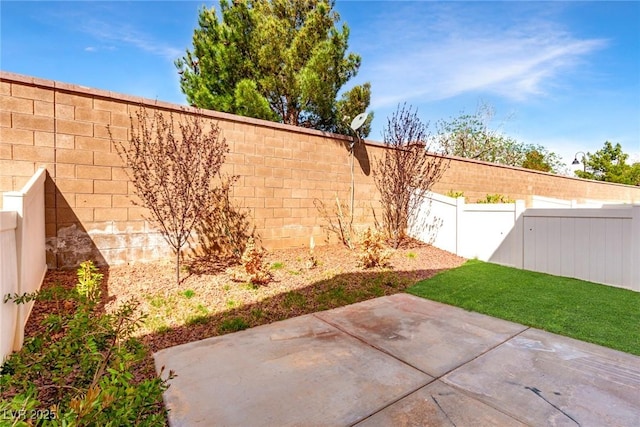 9333 Leaping Deer Pl Unit 102, Las Vegas, NV 89178 - fenced backyard with a patio area
