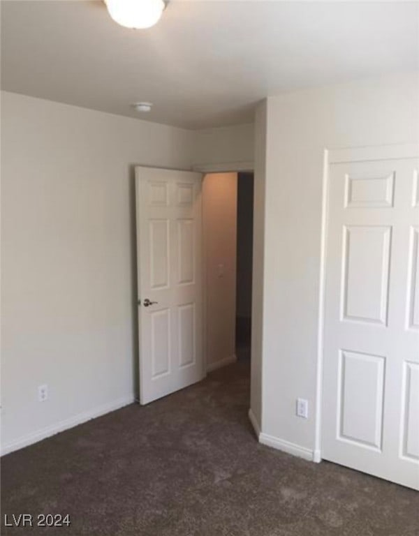 unfurnished bedroom with carpet