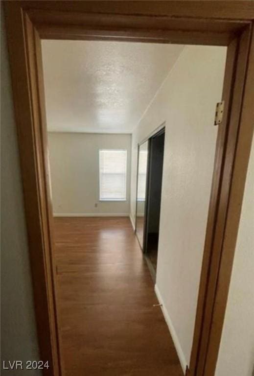 hall featuring dark hardwood / wood-style floors