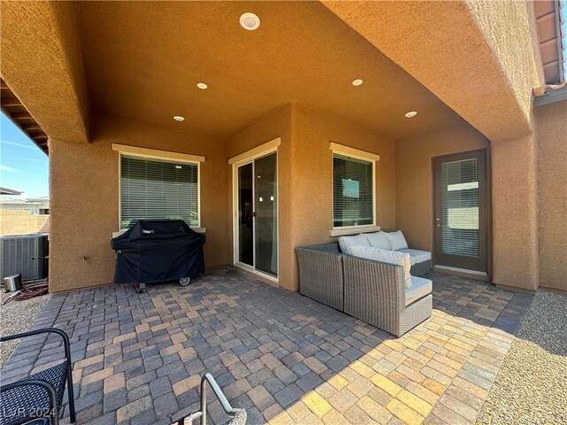 view of patio featuring central AC and area for grilling